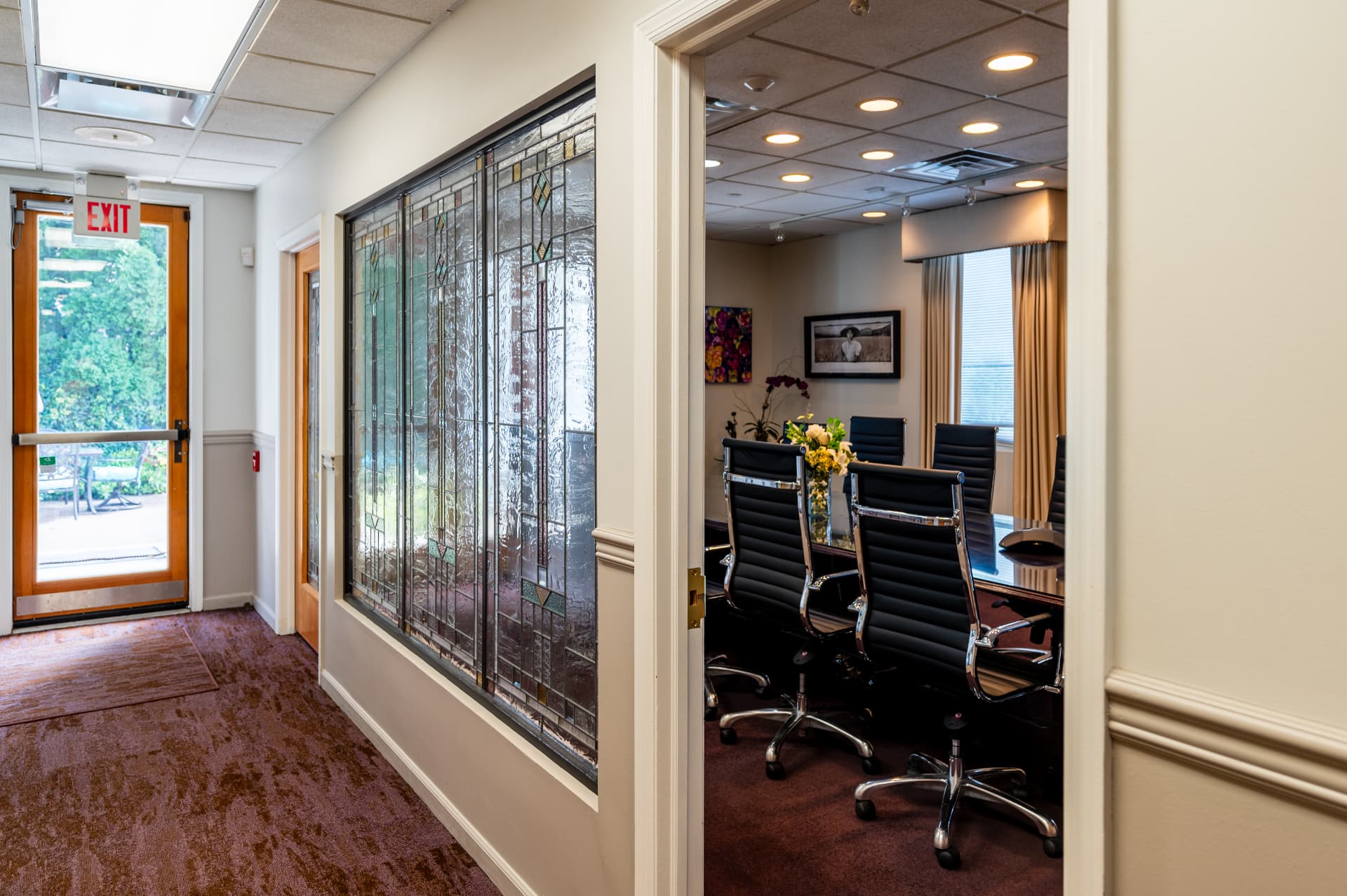 Boardroom seen from the stained-glass hallway